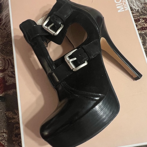 Michael Kors patent leather platform heels. Buckles and ankle height. 
Size 7M - Picture 6 of 16